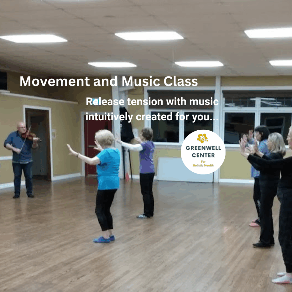 5 older women doing Tai Chi while a fiddler plays music