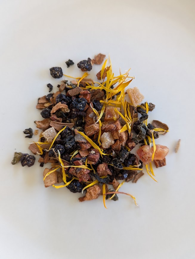 herbs for tea, including pineapple, apple, and papaya