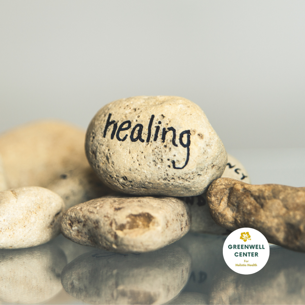rocks piled with one saying healing